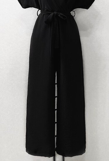 Zwarte cross heart jumpsuit.