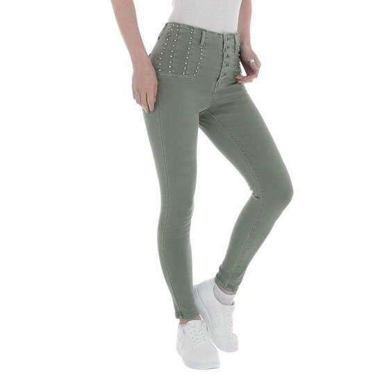 Groene high waist jeans met knoppensluiting.