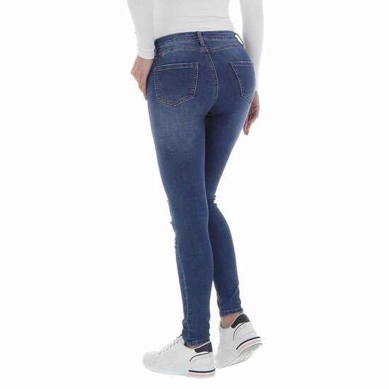Skinny high waist donker blauwe jeans in used look.