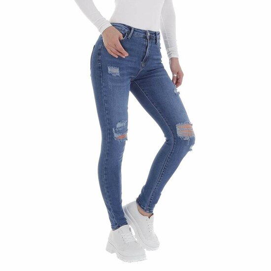 Skinny high waist blauwe jeans in used look.