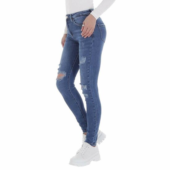 Skinny high waist blauwe jeans in used look.
