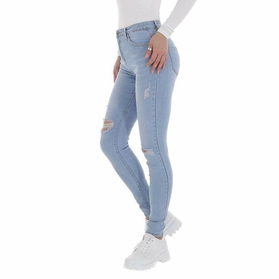 Skinny high waist licht blauwe jeans in used look.