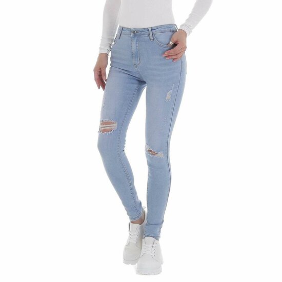 Skinny high waist licht blauwe jeans in used look.