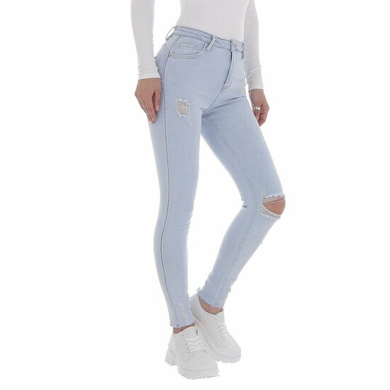 Skinny high waist zeer lichte blauwe jeans in used look.