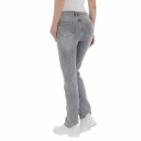 Skinny high waist licht grijze jeans in used look.