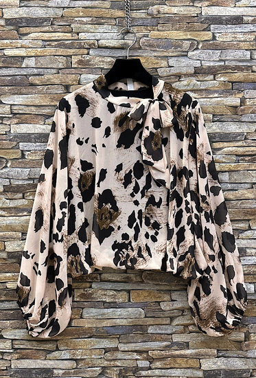 Trendy korte blouse met strik in cowprint