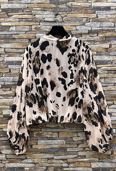 Trendy korte blouse met strik in cowprint