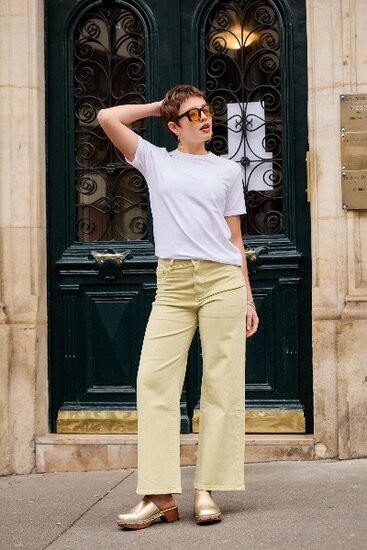 Trendy licht gele broek met wijde pijpen