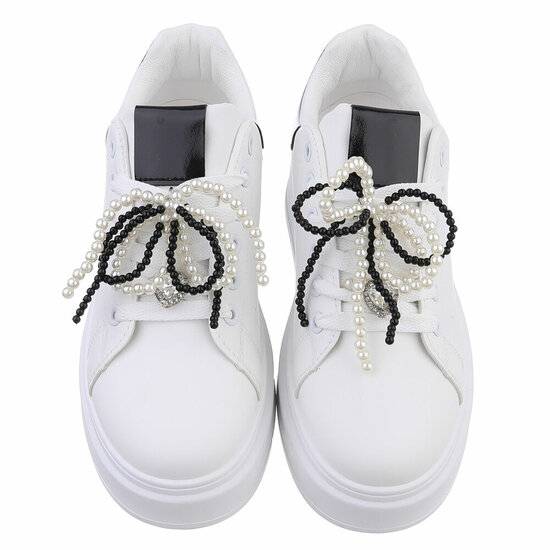  Lage wit-zwarte sneaker Celina