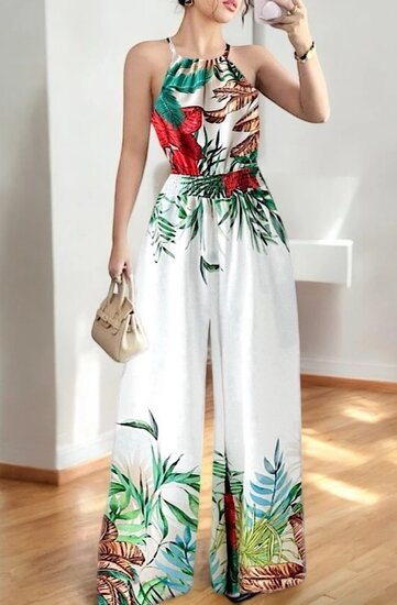 Combinaison blanche à la mode avec imprimé de plantes tropicales
