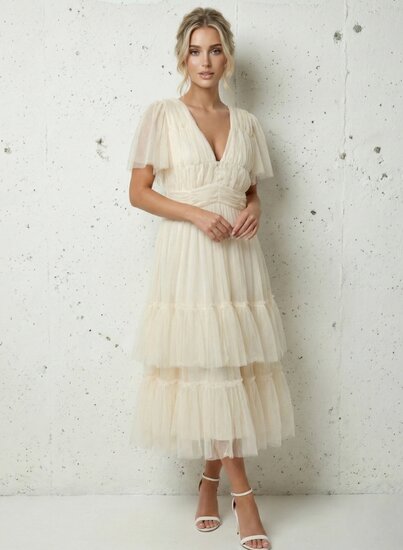 Magnifique lange gelaagde fijne chiffon jurk in cream kleur