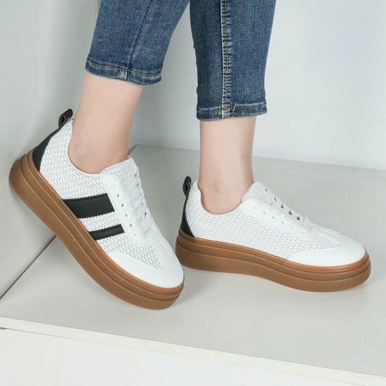 Witte platform sneakers Clauvie met zwart detail