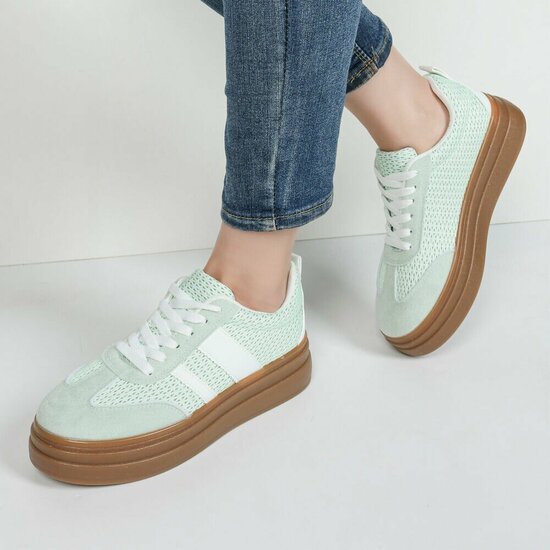 Groene platform sneakers Clauvie met wit detail