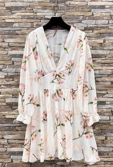 Mooie korte witte jurk met bloemen print