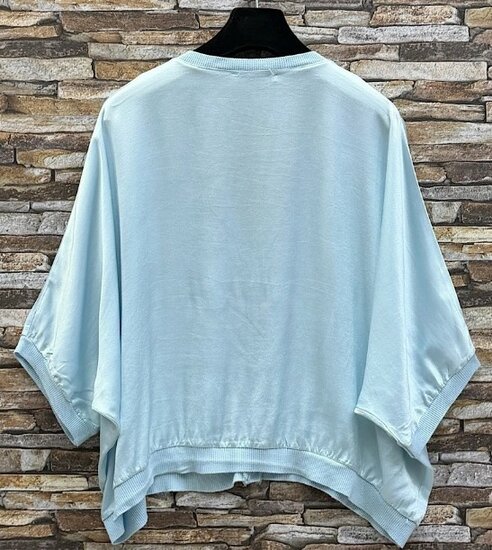 Licht blauwe gilet in satin 