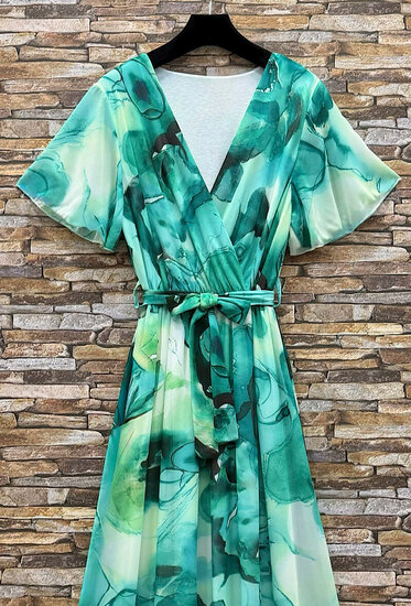 Elegante maxi jurk met turquoise bloemenprint en strikceintuur