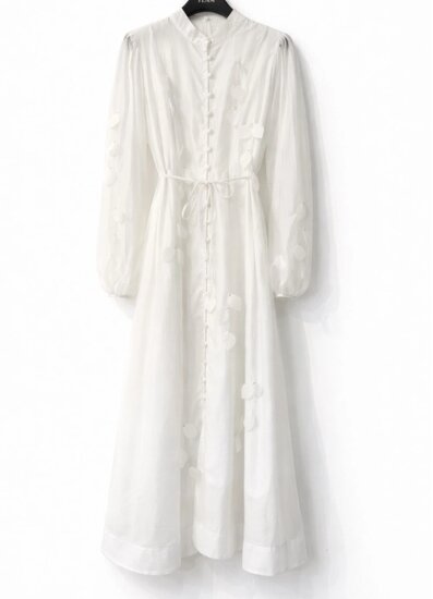 Elegante witte lange jurk met verfijnde details