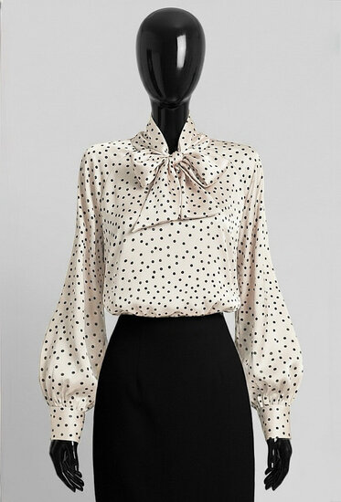 Elegante beige blouse met stippen en strik