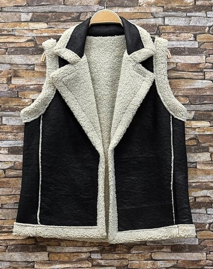 Luxe zwarte bodywarmer met teddy afwerking
