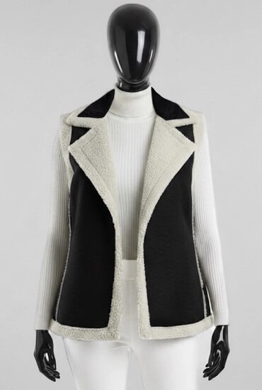 Luxe zwarte bodywarmer met teddy afwerking