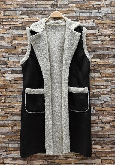 Luxe zwarte midi bodywarmer met teddy afwerking
