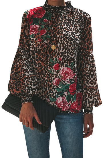 Blouse chic met leopardprint.