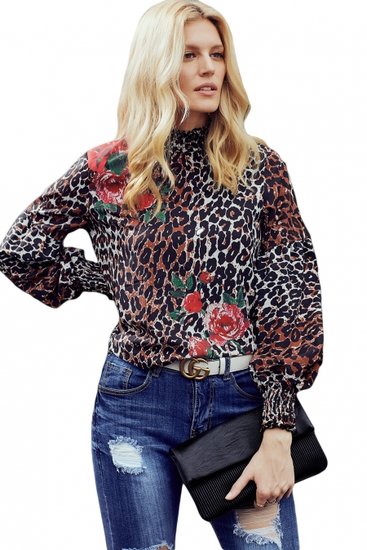 Blouse chic met leopardprint.