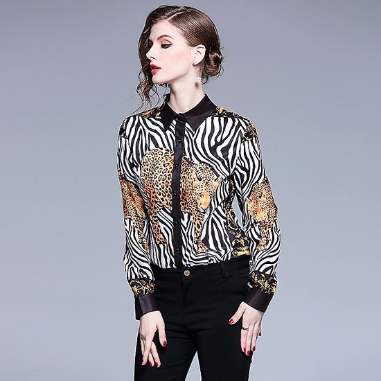 Trendy blouse met contrasterende kleuren.