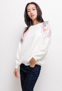 Trendy witte trui met motief in sequins.