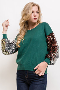 Fashion groene trui met sequins.