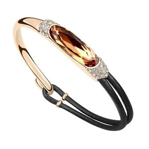 Luxe gouden fashion armband met gele edelsteen.SOLD OUT