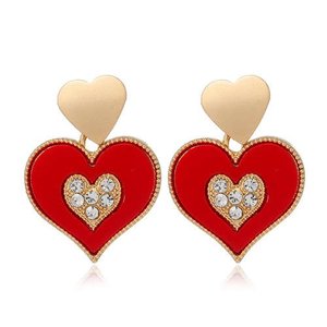 Boucles d'oreiles rouge/or coeur à coeur.
