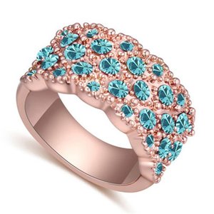 Classy rose gold plated ring met blauwe bergkristallen.