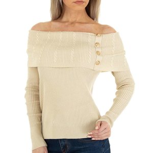 Beige pullover shoulders off.