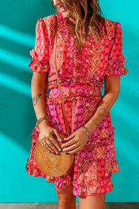 Korte oranje boho jurk.