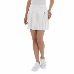 Mini jupe plissée blanche.