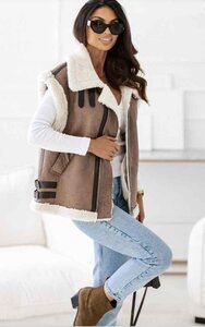 Fashion bodywarmer taupe avec doublure blanche.SOLD OUT