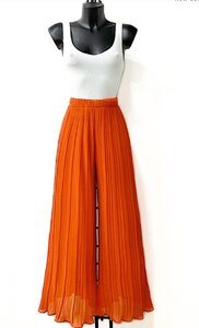 Trendy oranje plisse broek  