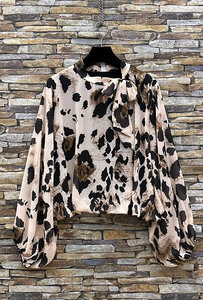 Trendy korte blouse met strik in cowprint