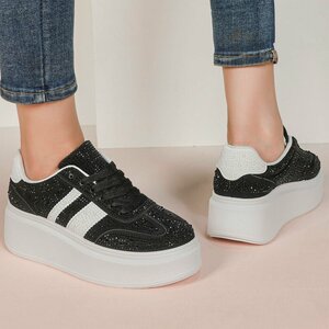Zwarte lage sneaker met wedge zool Doris