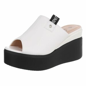 Witte platform mules met zwarte wedgezool Cintia