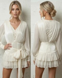 Cream couture mini jurk met kant en plissé – verfijnde avondjurk