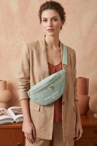 Licht groene ribstof crossbody heuptas