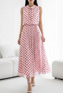 Roze midi jurk met donkerroze stippenprint en plissérok  SOLD OUT
