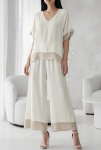 Breige viscose set met gehaakte details