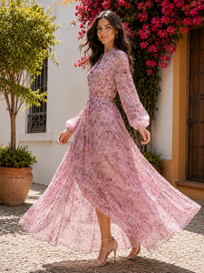 Lange roze bloemenjurk met romantische print en volantdetails