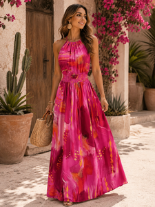 Trendy en chique armloze maxi halterjurk in fuchsia