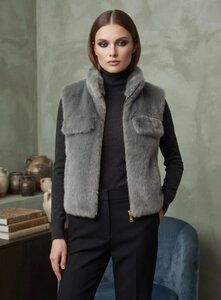 Grijze bodywarmer in teddy fleece