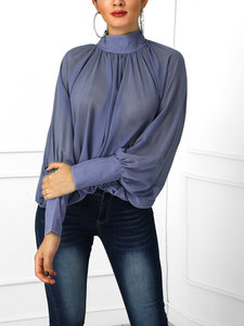 Blauw-grijze vintage blouse.